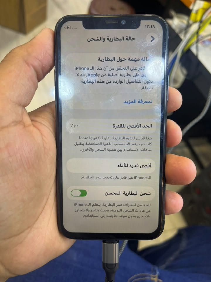 ايفون 11 برو فقط مبدل شاشة بطارية  🪫 ضهر ذاكره 265   السعر 150 الف بي مجال لحك جية
***********

نص مكتوب في الصور:
- ١٢:٤٧
- حول
- < iPhone
- الاسم
- 26.5
- إصدار iOS
- none 11 Pro
- اسم الطراز
- MWCC2J/A
- رقم الطراز
- C39ZPFMEN6Y9
- الرقم التسلسلي
- سجل تاريخ القطع والخدمة
- الأغاني
- الفيديوهات
- الصور
- ٢٥٦ غ.ب.
- السعة
- ٢٣٨,٦٤ غ.ب.
- متوفرة
- المزيد للـ iPhone
- إنهاء إعداد iPhone
- حقق أقصى استفادة من iPhone مع ميزات
- مثل حساب Apple و Siri وبصمة الوجه
- و Apple Pay.
- إنهاء الإعداد
- لم يتم التعرف على البطارية
- غير قادر على تحديد ما إذا كانت بطارية
- iPhone لديك بطارية أصلية من Apple أم لا.
- معرفة المزيد
- لم يتم التعرف على الشاشة
- غير قادر على تحديد ما إذا كانت شاشة
- iPhone لديك شاشة أصلية من Apple أم لا.
- ١٢:٤٨ حالة البطارية والشحن رسالة مهمة حول البطارية غير قادر على التحقق من أن هذا الـ iPhone يحتوي على بطارية أصلية من Apple. قد لا تكون التفاصيل الواردة من هذه البطارية دقيقة. لمعرفة المزيد الحد الأقصى للقدرة ١٠٠٪ هذا قياس لقدرة البطارية مقارنة بقدرتها عندما كانت جديدة. قد تتسبب القدرة المنخفضة بتقليل ساعات الاستخدام بين عملية الشحن والأخرى. أقصى قدرة للأداء الـ iPhone غير قادر على تحديد عمر البطارية. شحن البطارية المحسن للحد من استنزاف عمر البطارية، يتعلم الـ iPhone من عادات الشحن اليومية، بحيث ينتظر ولا يتجاوز ٨٠٪ حتى يحin موعد حاجتك إلى استخدامه.