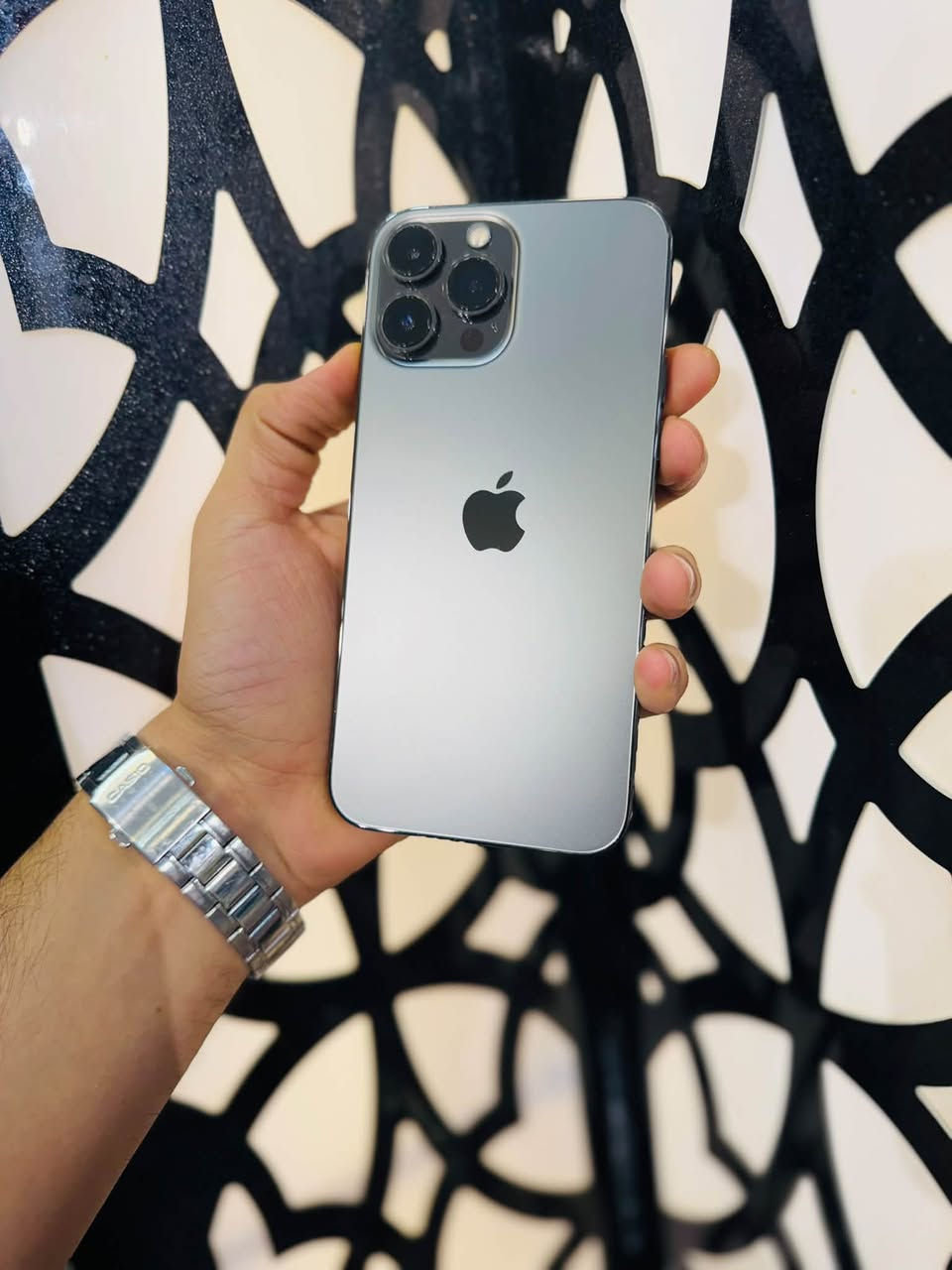 سلام عليكم

ايفون 13Pro Max بلادي بلادي (وتر بروف)
ذاكرة 256 بطارية 92% 
مكفول من كلشي شخط مابي 
كامل ملحقاته الاصلية (كارتون-كيبل)
اللون المميز 🩶
الجهاز ع فحص 
بسعر 775 وبي مجال

للاستفسار // ***********

نص مكتوب في الصور:
- 10:58
- حالة البطارية والشحن
- كما هو الحال مع البطاريات القابلة لإعادة الشحن، بطارية الهاتف قابلة للاستهلاك وتصبح أقل فاعلية مع الوقت. معرفة المزيد...
- 92%
- الحد الأقصى للقدرة
- هذا قياس لقدرة البطارية مقارنة بقدرتها عندما كانت جديدة. قد تتسبب القدرة المنخفضة بتقليل ساعات الاستخدام بين عملية الشحن والأخرى.
- أقصى قدرة للأداء
- تستساعد الأنظمة المدمجة في النظام والمكونات في تخفيف آثار الأداء التي قد تلاحظها أثناء التقدم الكيميائي في عمر بطارية iPhone.
- شحن البطارية المحسن
- للحد من استنزاف عمر البطارية، يتعلم الـ iPhone من عادات الشحن اليومية، بحيث ينتظر ولا يتجاوز 80% حتى يحين موعد حاجتك إلى استخدامه.
- حول
- < iPhone
- الاسم
- < 17.0
- إصدار iOS
- iPhone 13 Pro Max
- اسم الطراز
- MLEJ3LL/A
- رقم الطراز
- GW9DT60XVD
- الرقم التسلسلي
- 0
- الأغاني
- الفيديوهات
- الصور
- 256 غ.ب.
- السعة
- 236,81 غ.ب.
- متوفرة
- 30:D5:3E:22:68:DD
- Wi-Fi عنوان
- Bluetooth
- 30:D5:3E:12:CE:F4
- 7.00.01
- البرنامج الثابت للمودم