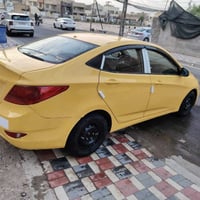 اكسنت • ٢٠١٣ • رقم بغداد