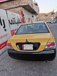 لانسر • توماتيك • رقم بغداد ٢٠١٠
