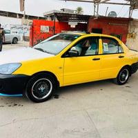 لانسر ٢٠١٠ • رقم بغداد • مكيف شغّال