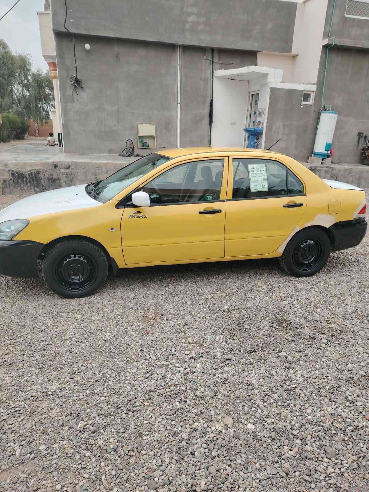 لانسر ٢٠١٠ • مكينة ٢٠٠٠ • ضربة خلفي