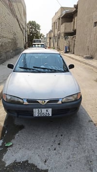 بروتون ٢٠٠١ • كير اوتو • لايت زينون