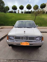 نیسان 1988 گێڕو مەکینەو ئەکسلی 2002 ئارمی پلاستیک بەشەرتی غەرامە سەیار...