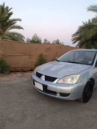 لانسر • ٢٠١٠ • مراوس ٧ راكب