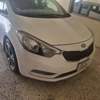 كيا سيراتو ٢٠١٤  محرك ١٦٠٠  ماشيه ٢٧٠  تبريد ثلج  تخم تاير  صدره حدادي...