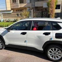 كورلا هايبرد • ٢٠٢٥ • جلد احمر