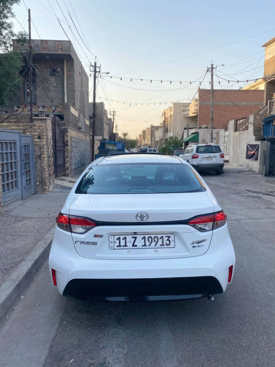 ‭***********‬ السلام عليكم كورولا شكل الأمريكي هايبرد السياره فول فول  مواصفات بدون اي نقص جاهزه موديل 2025 السياره مكفوله من صبغ وتبديل والحادث مكينه 1800 هايبرد بصمه فتحه فول مواصفات تخم تاير صدر أمامي خلفي كله جديد السياره مغلفه بالكامل عازل حراري السعر 147 وبيهه مجال العنوان بغداد حي الجهاد
