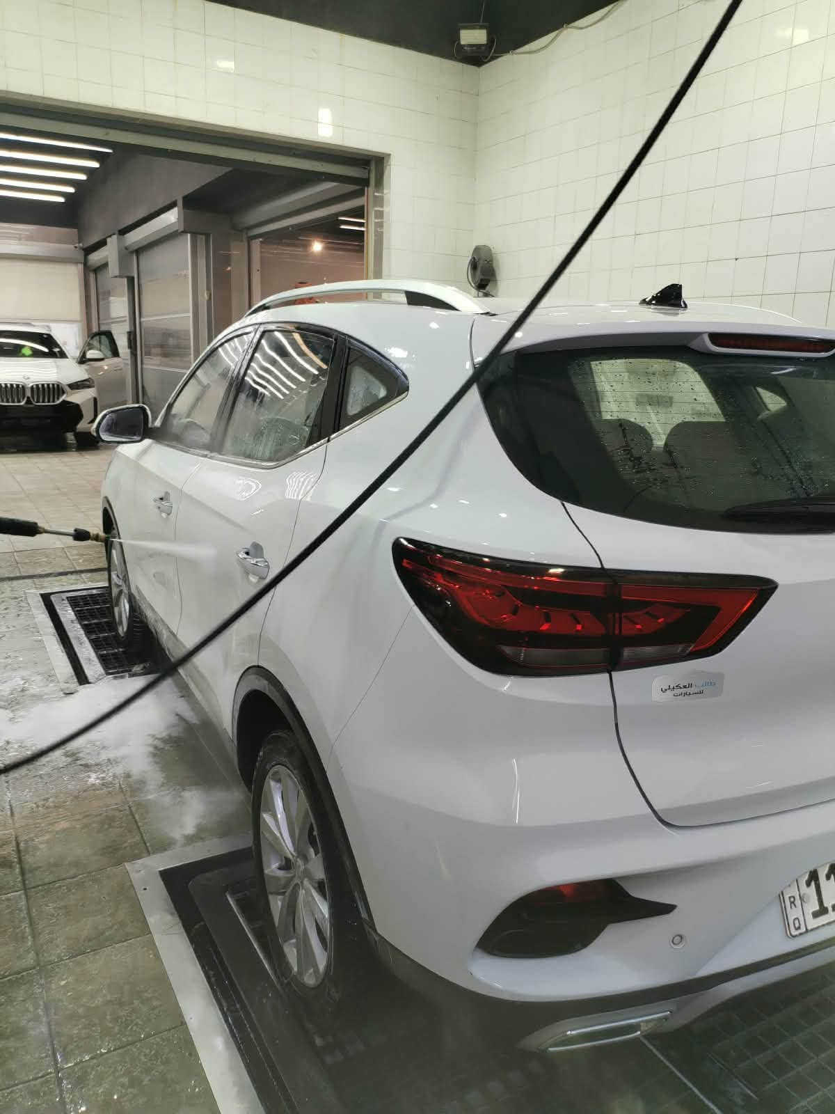 موديل 2021 
 رقم بغداد الجديد الدولي 

مواصفات السيارة
* الموديل MG ZS2021
* محرك: 1500 اقتصادي 
* اللون: ابيض 
* ناقل حركة: أوتوماتيك
*  تشغيل بصمة + دخول ذكي
* بصمة ابواب
* ستيرن جلد ( تحكم جهتين ) 
* حاكية للإتصال والرد على المكالمات
* بلوتوث + USB
* شاشة لمس كبيرة متعددة الوسائط (اندرويد اوتو + كار بلي)
* كامرة خلفية دوارة 
* حساسات خلفية 
* هاند بريك دكمة 
* نظام اوتو هولد 
* نظام نزول منحدرات
* بصمة عدد ( 2 )
* تبريد قطعتين + تدفئة 
* لايت زنون عالي + ناصي
* لدات نهاري 
* بك لايت LED
* مرايا كهرباء + اشارات بالمري 
* كشافات هالوجين
* مثبت سرعة ESP
* مانع انزلاق المكابح APS
* حساسات نظام مراقبة ضغط الإطارات TBMS
* جنوط أصلية 
* ويل كب عدد ( 5 )
* ايرباك AIR BAG عدد ( 2 )
* حاملات اكواب عدد ( 6 )
* سبير منازل من الجنطة ولا مفتوح + المعدات كاملة الأصلية غير مفتوحة

السعر المطلوب (98)
مكان السيارة بغداد / بغداد الجديدة
رقم الهاتف /***********
