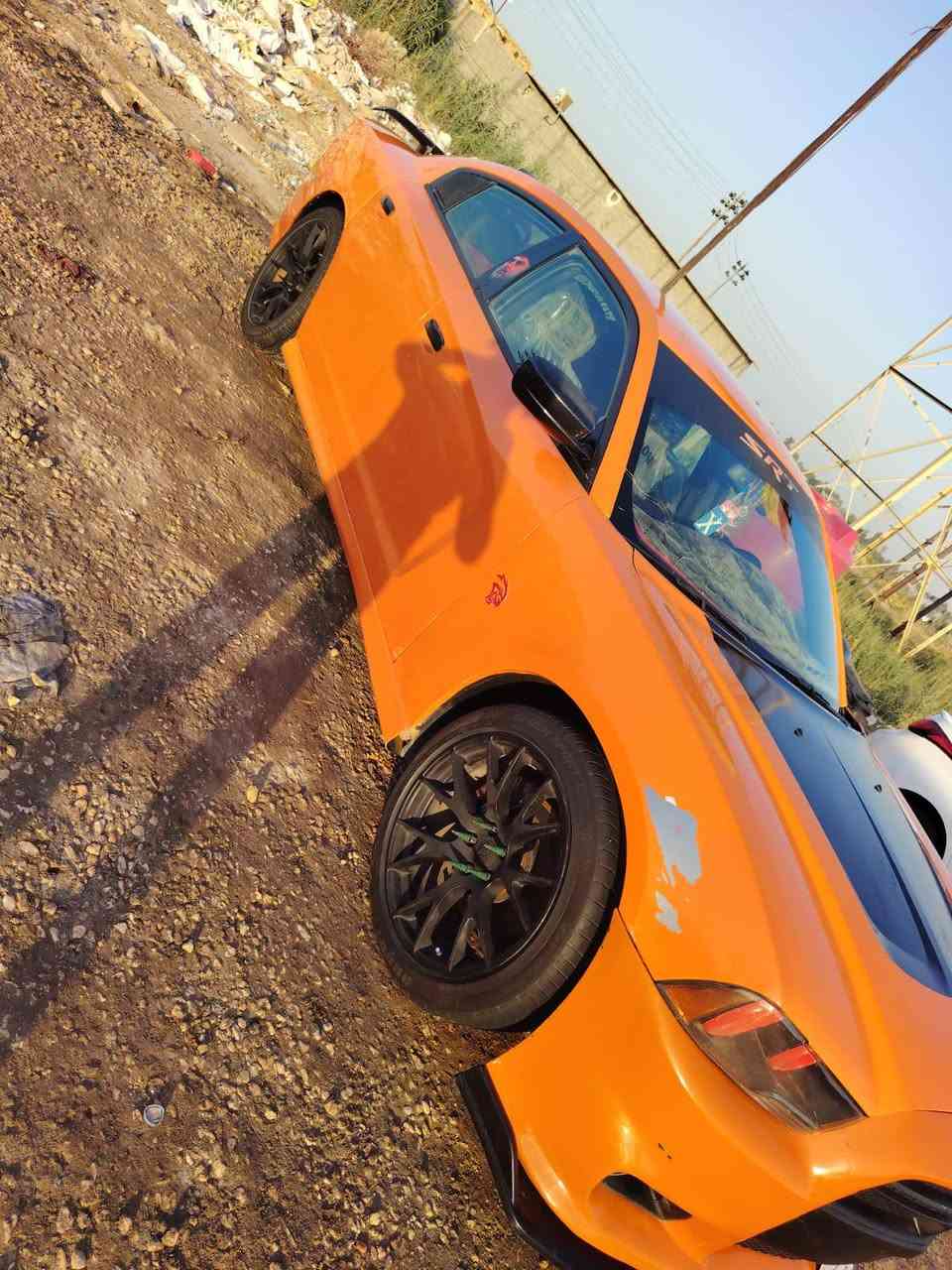 جارجر موديل ١٤ لونه مميز برتقاليه 🍊 بلادي مكينه ٥٧٠٠هيمي السياره ارتي فول من عده الفتحه السياره خصوصي بسمي  لستفسار اتصل *********** لستفسار اتصال رقمه بغداد بسمي كبل احولك مكانه  ديوانيه ترهم اقصاد حسب الاتفاق
