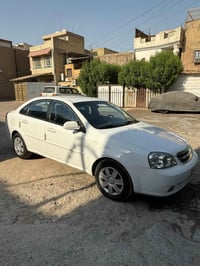 للبيع اوبترا2012 كلشي بالسيارة مكفول كير/ محرك/تبريد/كهربائيات/صبغ/ضرب...