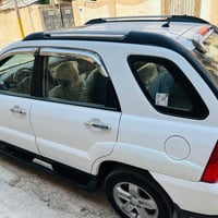 سبورتج2009خليجي مكفولة من الصبغ لون ابيض فتحة سقف داخل بيجي رقم بغداد ...