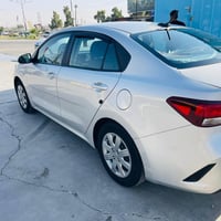 كيا ريو 2023  رقم اربيل  ماشي 37 الف  مواصفات نص فول ضرر السيارة صندوق...