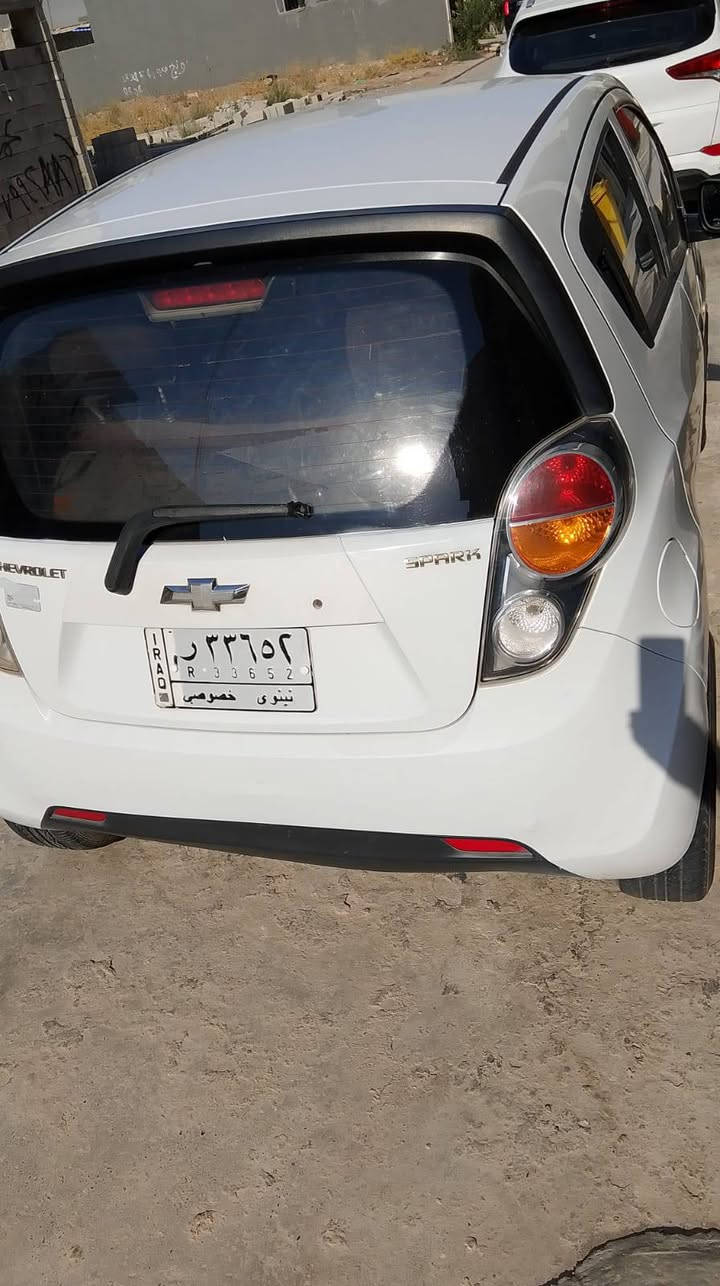 للبيع شوفاليت سبارك موديل 2012 بيها كربون بنزين الكتروني غرامات صفر كير عادي محرك 1400كير محرك شرط تبريد شغال رقم نينوى مشروع وطني اني صاحب شرعي مكاني موصل حي تعليم ضرار بيها بس قطعتين صباغ استفسار على رقم***********
