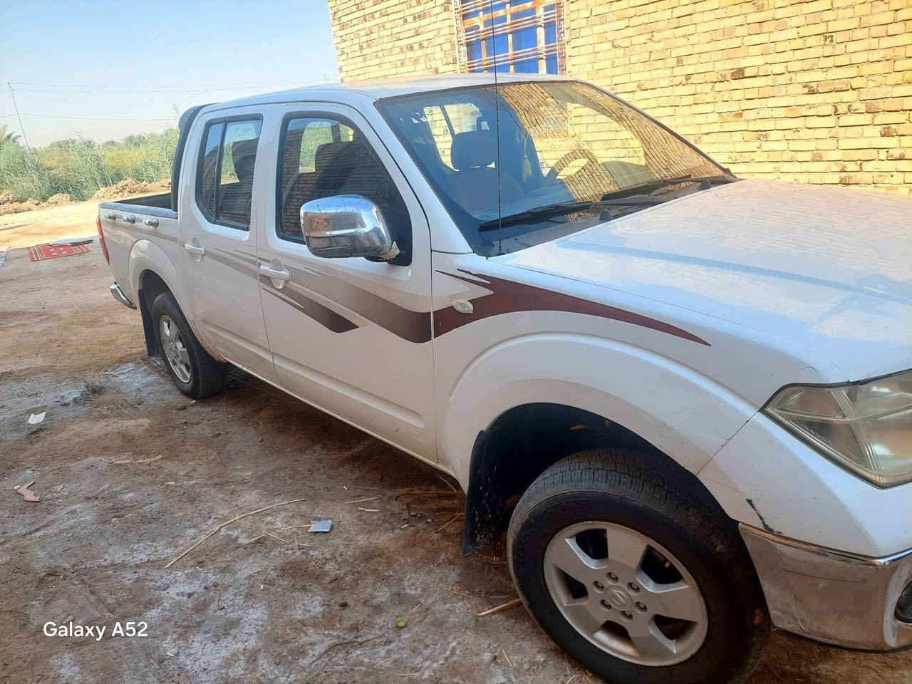 نيفاره 2012
سياره خير من الله 
رقم قادسية دولي قبل شهرمرقم 
سياره بسمي سنويه 2031
محرك 3000VVT-قبل سبوع شاده
كير اوتوماتيك 
تبريد ثلج 
تايرات تخم جديد هسه مبدلهن 
حادثها بابين الجها اليسره 
سعره ال سياره 85وبيها مجال
ترهم مراوس بسياره عاليه وفرق نتفق 
مكان سياره السماوه الرميثه فرع الهلال 
رقم اتصال ***********

نص مكتوب في الصور:
- Galaxy A52