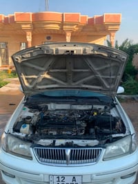 نيسان صني • ٢٠٠٣ • رقم دولي