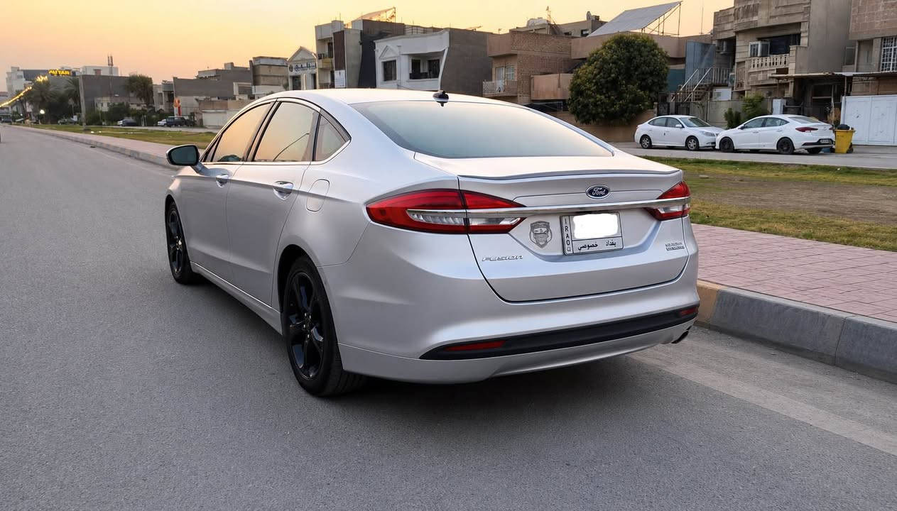 السلام عليكم .. فورد فيوجن هايبرد موديل 2018 رقم بغداد محرك 2000 تنفس طبيعي محرك وكير وبطارية مكفولات ترايك وين ما تحب والامريكي معروف  
التبريد ثلج 
منضومة زنون عالي ناصي 
بصمه تشغيل
شاشه اندرويد 
تحكم استيرن جهتين 
اشاير بالمري 
السيارة فول مراصفات عدا الفتحه
صدر وتخم تاير نظيف
وارد امريكي حادثها جهة اليسار تبديل 4 قطع نفس اللون بلادي بدون دواخل شواصي لغود مكفولات
وصبغ وجاملغ خلفي فقط 
صارت بيها ضربه بسيطه بالجديد بعدها ما مصلحه 
بيع او مراوس بمكينه جبيره . جالنجر كمارو شعندك راسلني واتساب *********** حلة, بابل
