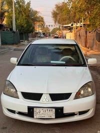 لانسر • ٢٠١١ • مكينه ٢٠٠٠