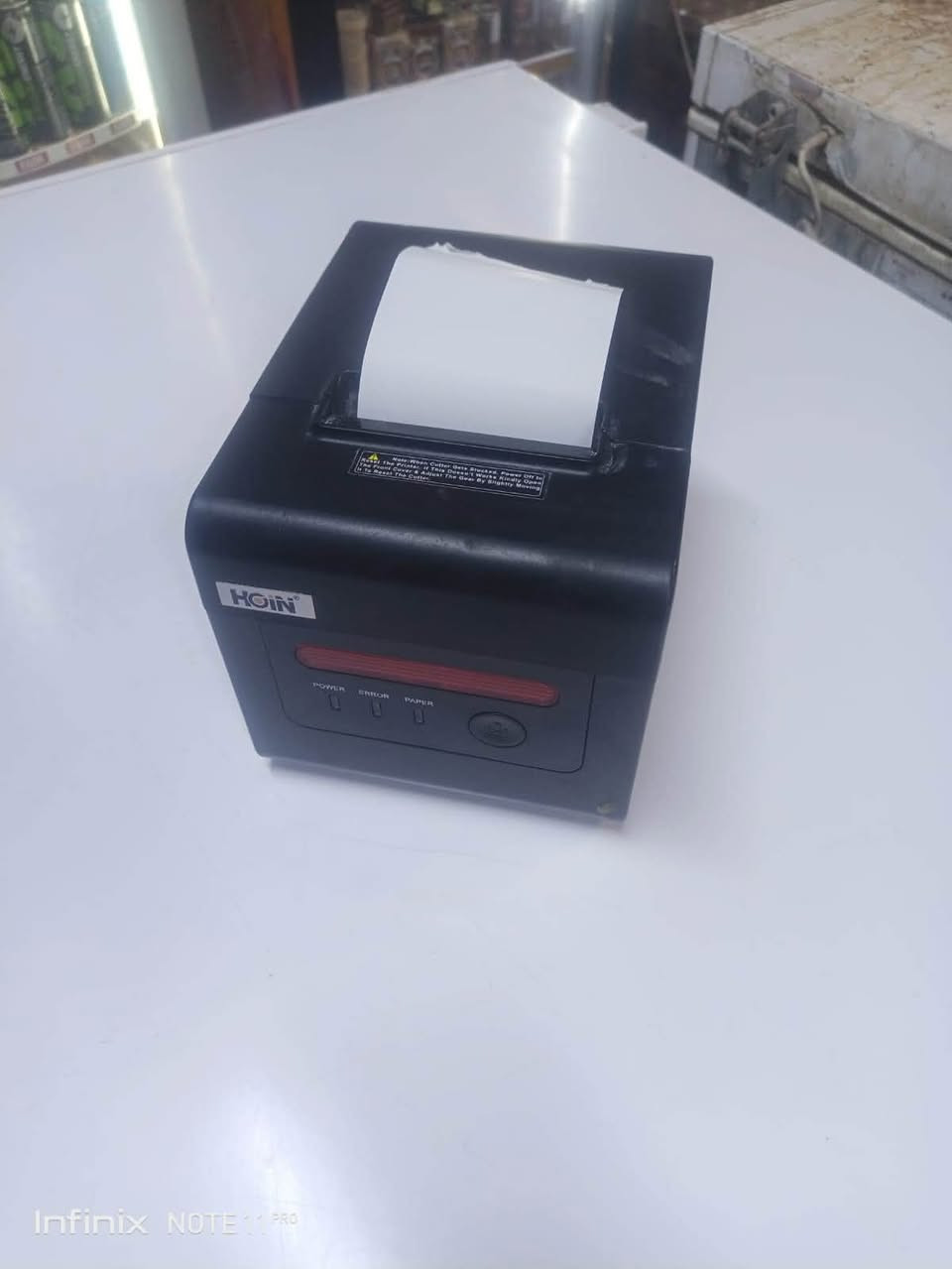 طابعة فواتير حرارية احترافية وعالية السرعة من ماركة HOIN (الموديل: HOP-H801) 🖨️
إذا كان لديك محل، مطعم، كافيه، أو مكتب توصيل وتعد الطباعة السريعة أولوية بالنسبة لك، فهذه الطابعة هي الخيار المثالي!

✨ مميزات الطابعة:

 بدون حبر: طباعة حرارية سريعة وواضحة بدون الحاجة لشراء حبر.

 سرعة خيالية: تطبع بسرعة تصل إلى 300\text{mm} في الثانية.

 ربط شامل ومتكامل: تدعم جميع أنواع الاتصال (USB + شبكة LAN + بلوتوث BT + وايفاي WiFi + منفذ COM).

 مرونة الورق: تدعم قياسات الورق الحجم الكبير 80\text{mm} والقياس الصغير 58\text{mm}.

 ربط كاشير: تحتوي على منفذ لربط درج النقدية (الكنتور) لتفتحه تلقائياً مع كل فاتورة.

 توافق تام: متوافقة مع جميع برامج المبيعات والكاشير وأنظمة POS.

💰 السعر: 45 ألف دينار فقط!

📦 الموقع / كربلاء ]

📞 للطلب أو الاستفسار: 

+964 771 706 8302
