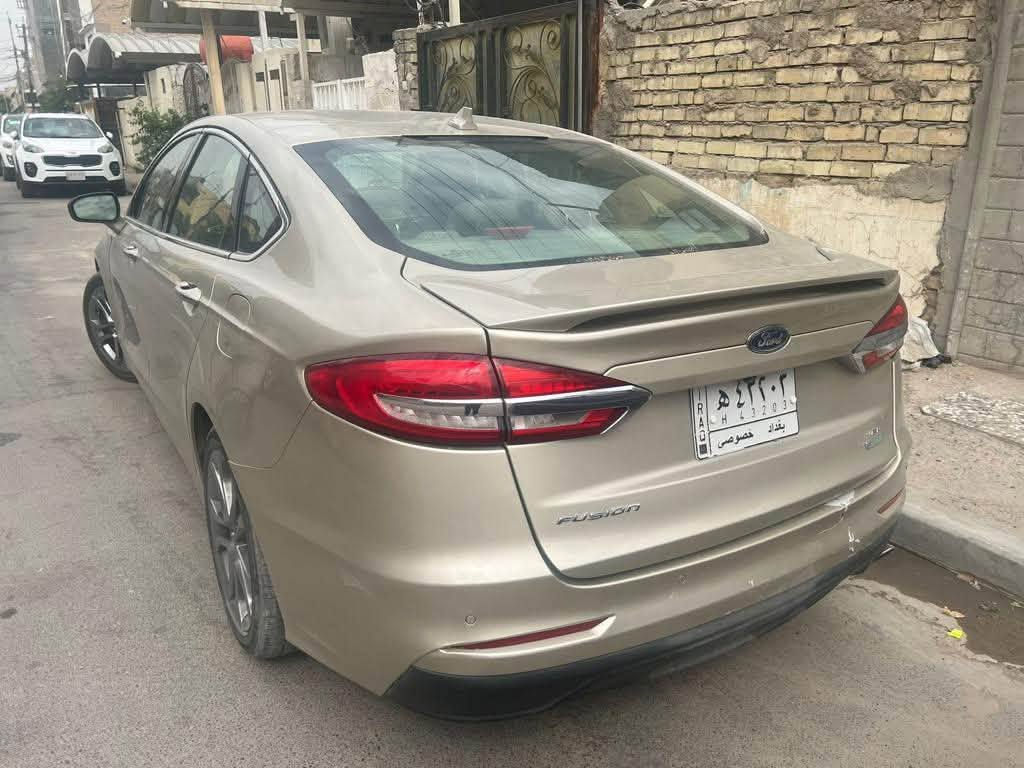 سيارة فورد فيوجن 2019 وارد امريكي (للبيع فقط )
الموصفات : 
- SEL(SEL )فوووول فووول  مواصفات للاخير 
-محرك 1500 تيربو
- كشنات جلد كهربائي بلادي  
- خزن ميموري مقعد السائق 
- حساسات امامي وخلفي ويمين ويسار 
- الصندوق كهربائي بصمة 
‏-  الابواب بصمة 
- باسورد باب السائق 
- التشغيل بصمة 
-تشغيل عن بعد 
-شاشة كبيرة وايضا شاشة ملاحة 
-كامرة دوارة وحساسات توقف ذاتي 
- اوتو هولد 
- هاند بريك كهربائي 
‏-الايرباكات كلهة سليمة
-ضربتهة بأمريكا جاملغ خلفي 
السيارة خير من الله دينار ما تتصرف عليهة 
اقتصادية بصرف البانزين
رقم بغداد بأسمي تحويل مباشر 
السعر :108$  وبيهة مجال تدلل
صور الحادث موجودة بالمنشور 
للاتصال على الرقم  ***********
