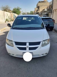 من رخصة مدير الاكروب  دوج 7 راكب  للبيع دوج موديل 2002 رقم نجف ألماني ...