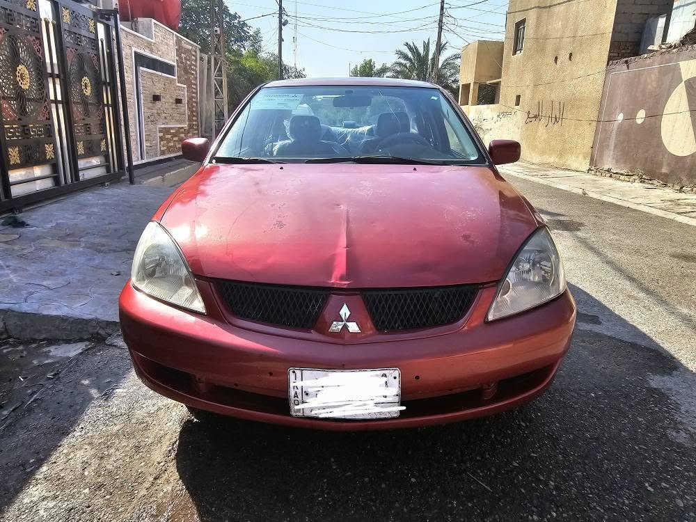 مسيبوشي لانسر 2011 رقم بغداد كير اوتماتيك نضيفه جدأ او ***********////*********** بغداد, العراق
