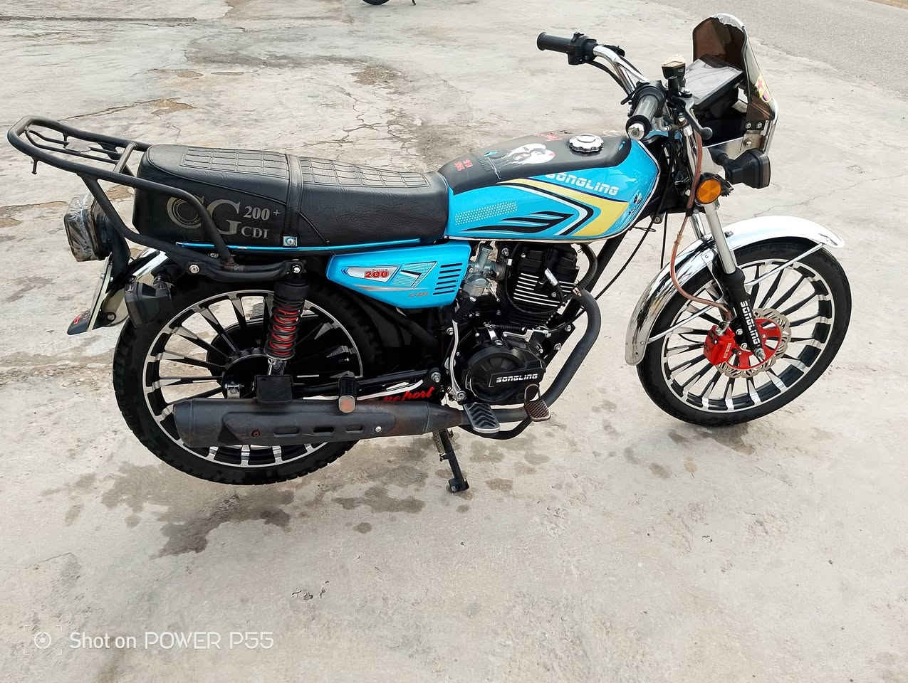 سلام عليكم دراجه سيفان موديل 26 دراجه كفاله عامه  دراجه حلوه او نضيفه السعر 850 بي مجال  الرقم***********

نص مكتوب في الصور:
- Shot on POWER P55