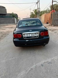 كيا اوبرص 2006 جهازه اي نقص مابيه   فول موصفات   تبريد ثلج   تخم تاير ...