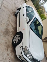 أسلام عليكم  نيسان سني 2002 كير عادي مكينه كير خير من الله حداديه خير ...