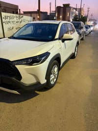 كورولا كروز • ابيض • فول مواصفات