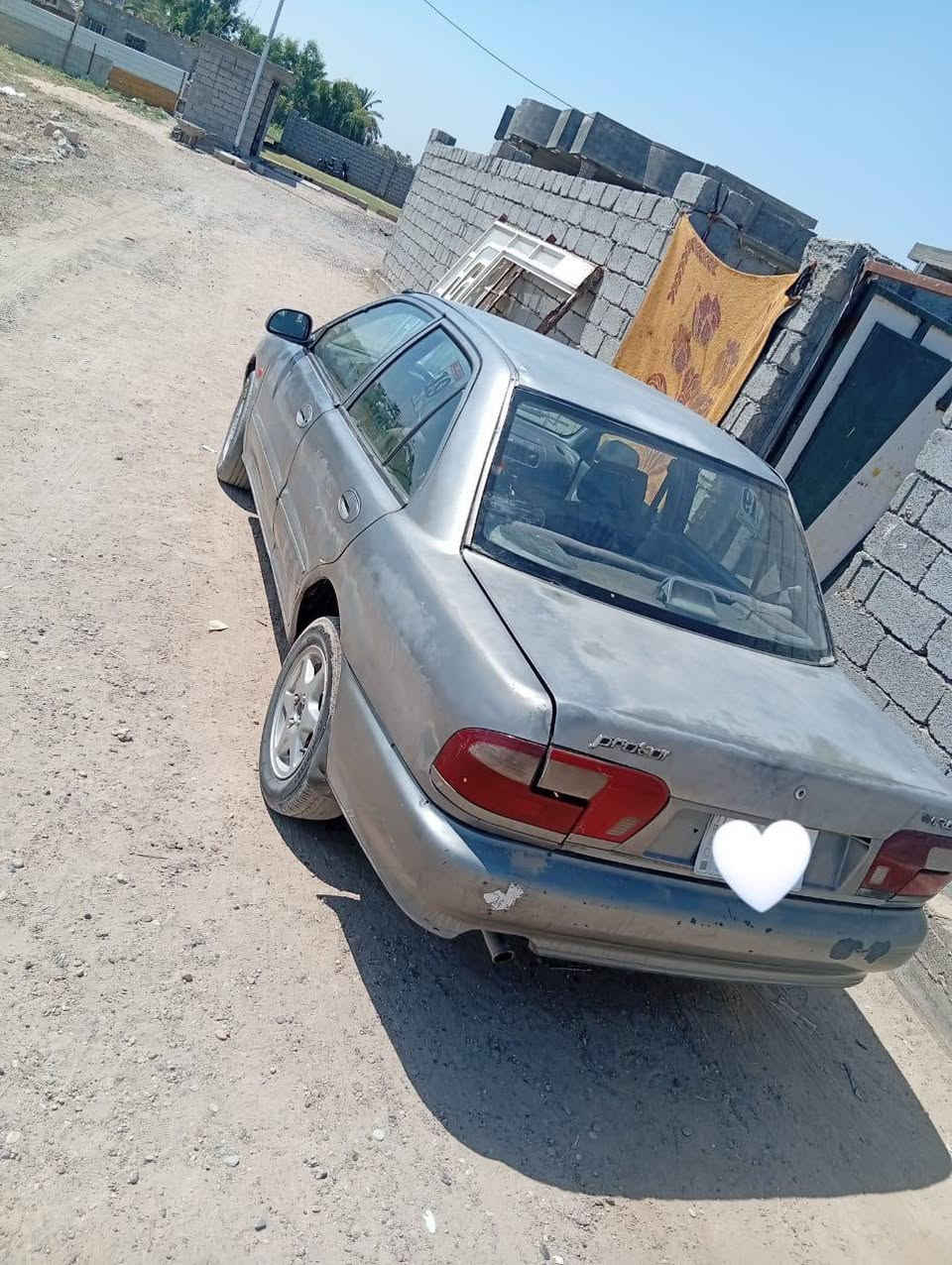 بروتون • بغداد • تاجي