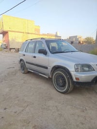 هوندا سي ار في  موديل 1997 رقم بغداد دولي  باسمي  سنويه لسنه 31 هزة جد...