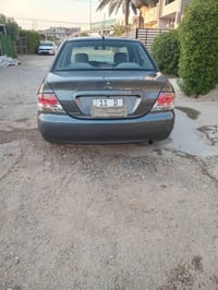 لانسر • ٢٠١١ • اوتوماتيك