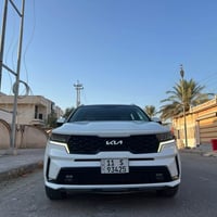 كيا سورنتو خليجي  رقم بغداد الماني بسمي  لون ابيض  موديل ٢٠٢٢  ٦ سلندر...