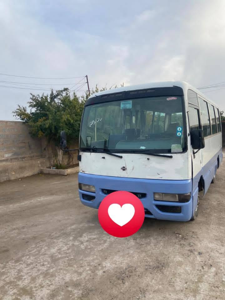 نيسان كوستر • ٢٠٠٢ • رقم بغداد