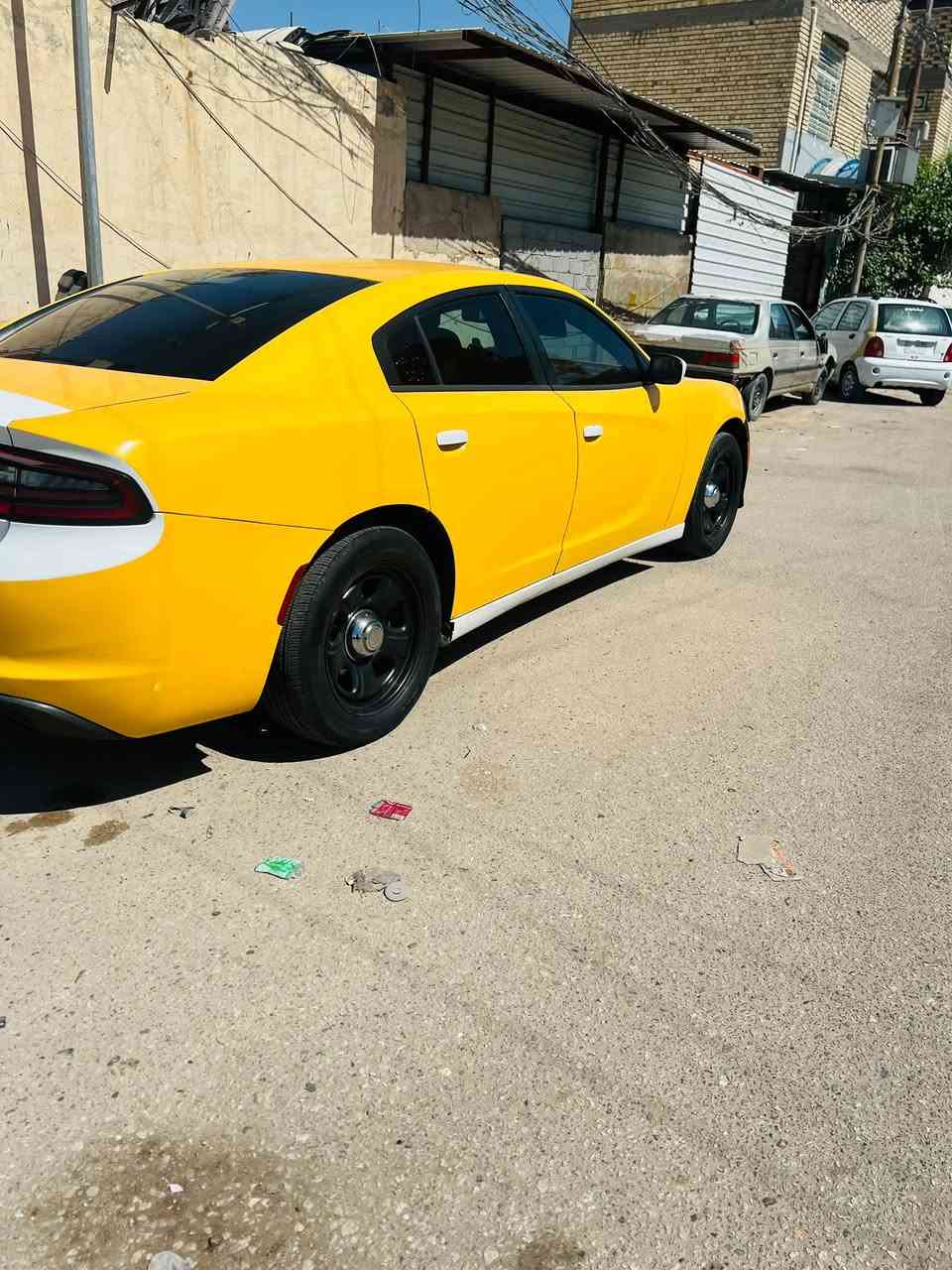 جارجر بوليسي 2019
كفاله عامه بس باب مبدل 
محرك ٣٦٠٠
تو ويل 
جاهزه من كلشي محرك كير حداديه 
بصره نجف الخط 
مكان السياره نجف 
***********

نص مكتوب في الصور:
- ***********