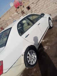 سيارة • نجف