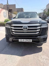 لاندكروز 2024 ( جي اكس أر - لمتدد - بريم اصلي ) رقم بغداد مغلفه PPF بد...