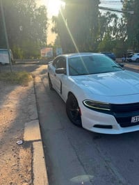 جارحر  موديل 2019 اللون ابيض وارد امريكي مواصفات SXT بصمه تشغيل وابواب...