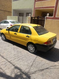 لانسر 2010 بغداد مصبوقه حزام مكينه 1500بيه بخاراوتماتيك  تبريد شغال سع...