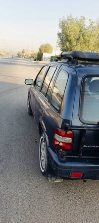كيا سورتج مديل 2001بلاديه مابيه ضربه محرك وكير بلادي اوتماتيك  تبريد ث...
