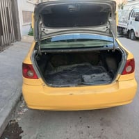 سياره لبيع كورلا نحله موديل ٢٠٠٧ بيه ضربه جاملغ خلفي عكس سايق وجاملغ ا...
