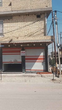 محلات للايجار في حي الرحمه على شارع 15ركن07710114531