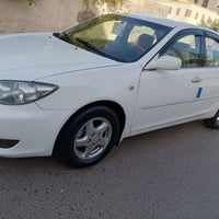 كامري 2004 • محرك 2400 • رقم بغداد