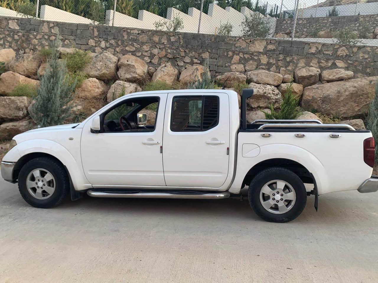 نيسان نافارا ٢٠٠٩ بي ده عم صبغ بنئ دوو ده رگه هان بي صه ربه يه يكجار ده عم تيدا نينه ويل تايره پاقژن سياره زئده پاقژه يا ماليه به ره قه م دهوك ١١٠ هزار غرامه يل سه ر سيره بي مه سره فه بئ ته قه و ره قه  بو پترو پيزانينان نا مه كي فريكه خاص دهوك, العراق
