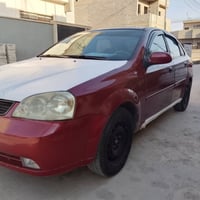 اوبترة رقم بغداد مصبوغا عام  موديل 2004 شرط وكاله وتحويل  تبريدها ثلج ...