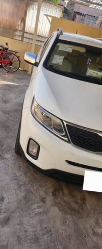 كيا سورنتو موديل 2014 7راكب 4 سلند تبريد ثلج حداديه صدر كله جديد بها س...