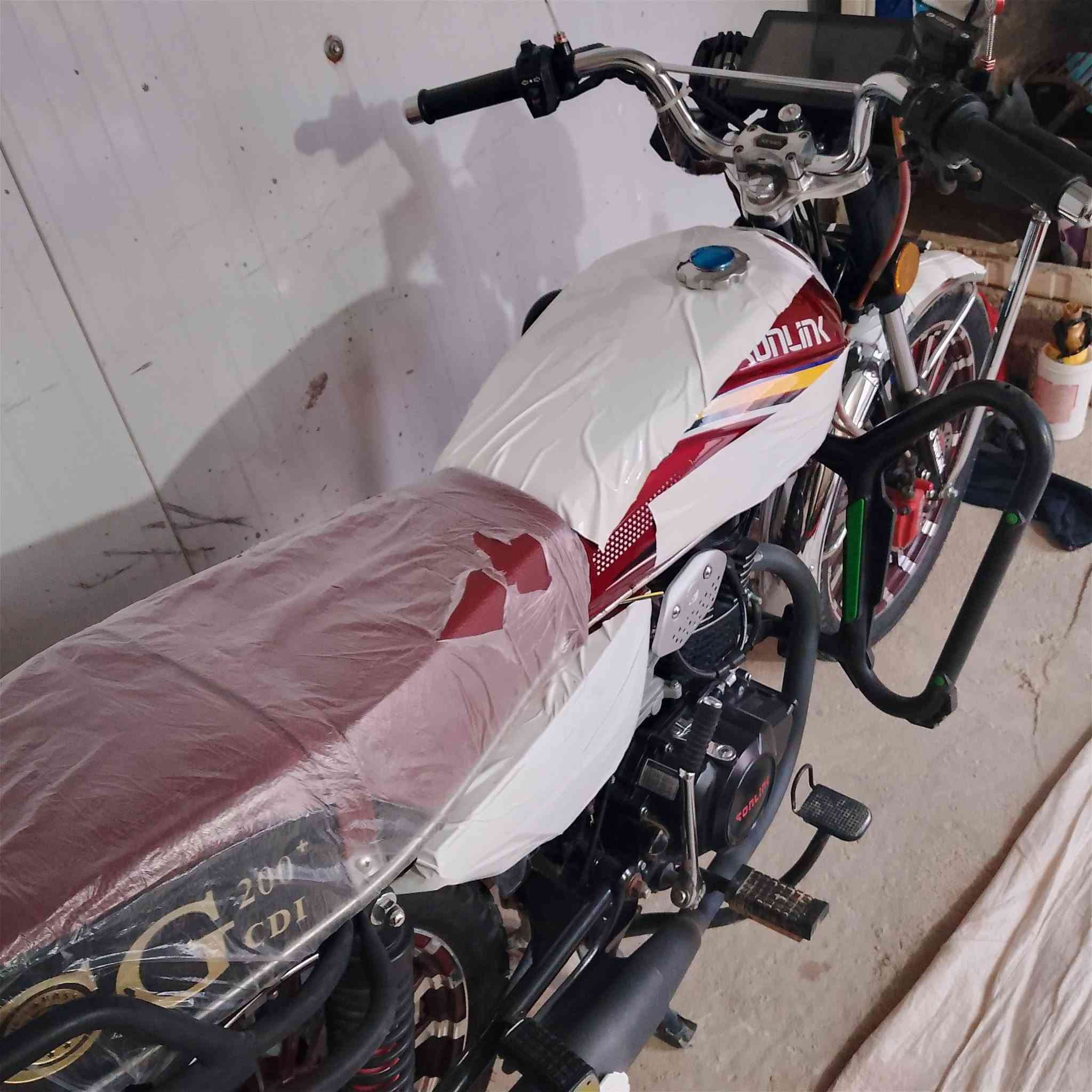 السلام عليكم دراجه موديل 25 محرك 200 زنجيل ماشيه 3000 بعدها وضع شركه نظافه خير من الله نشاط نعومه خير من الله مكان القائم دراجه مال جناي***********
