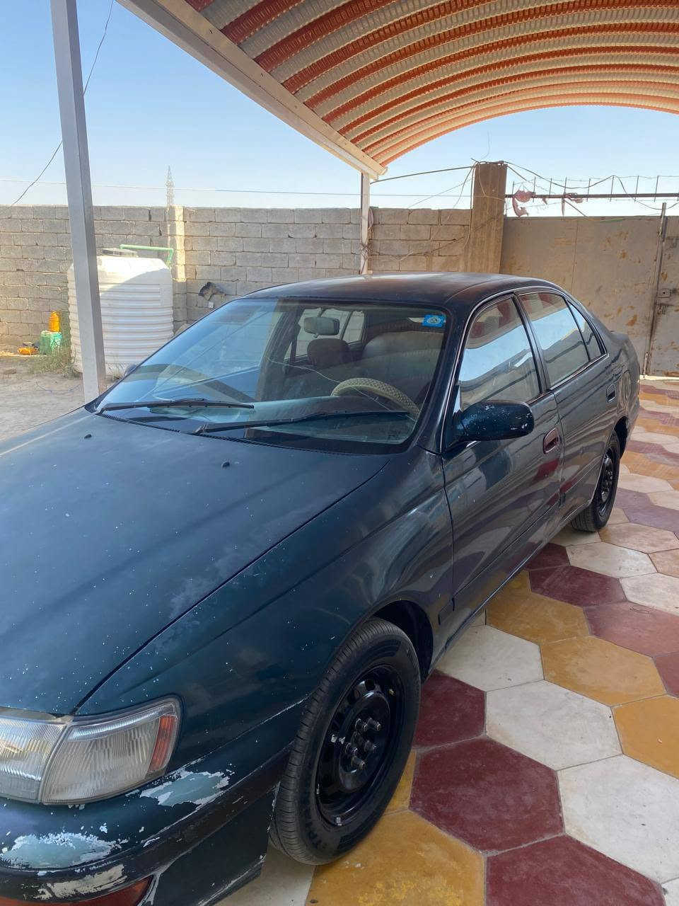 سلام عليكم كرونا موديل 96 مكفوله من ضربه اترايك للبصره السياره جاهزه يشهد الله من كلشي رقم بغداد انگليزي ملسق فقط حداديه ضعيفه بس المكان نجف كوفه رقم ***********
