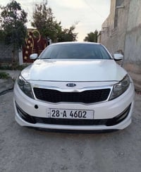 اوبتيما ٢٠١٢ • محرك ٢٠٠٠ • كفالة